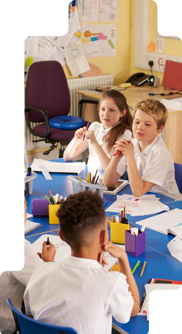 school students in classroom doing school work